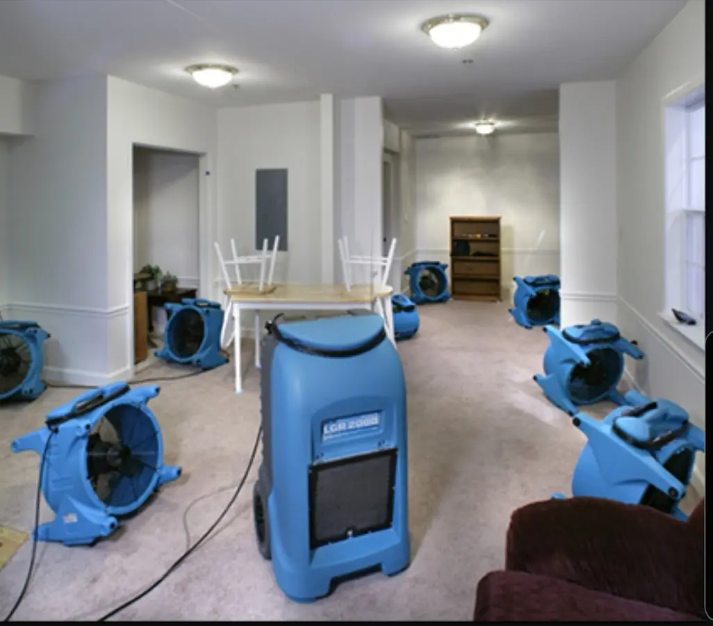 Air movers and dehumidifier setup for Water Damage Restoration in Johnstown